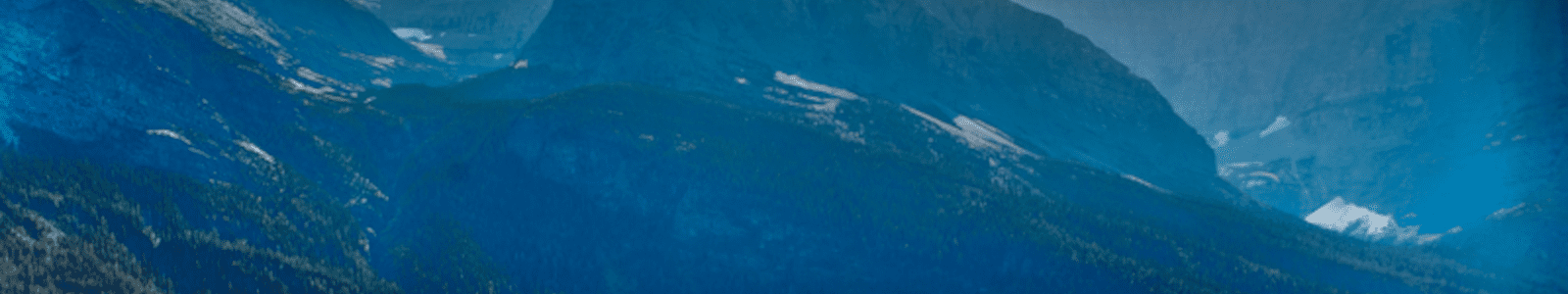 Blue mountain peaks in Glacier Natl Park